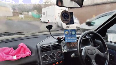 Mature tranny gets horny and jerks off while driving a car